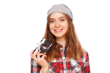 Teenage girl holding a film camera
