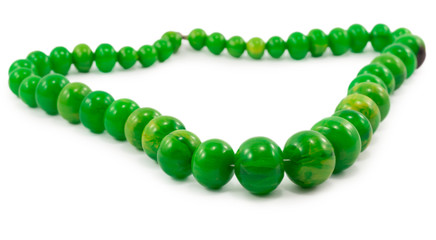 green beads isolated on white background