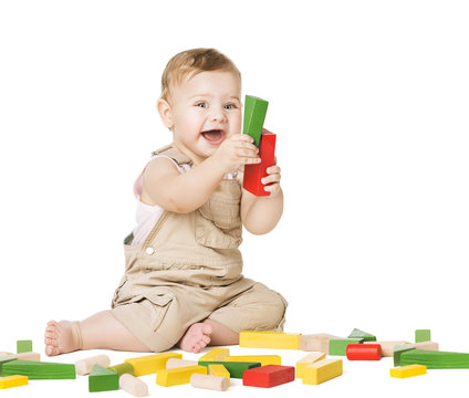 Child Playing Toys Blocks. Children Development Concept. Happy