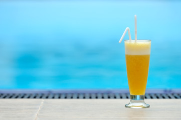 Cocktail at the edge of the swimming pool