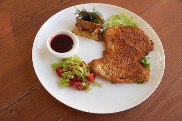 Roast meat with sauce and vegetable