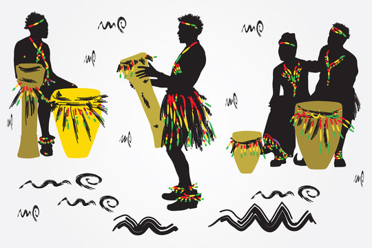 African Musicians dance and play the drums.