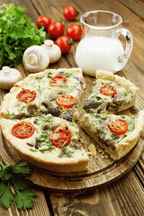 Kish with mushrooms and cherry tomatoes