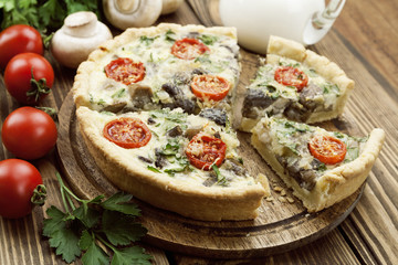 Kish with mushrooms and cherry tomatoes