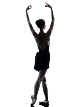 young woman ballerina ballet dancer stretching warming up  silho