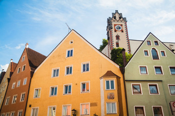 Naklejka premium Facades of old buildings and Hohes Schloss in Fussen, Germany