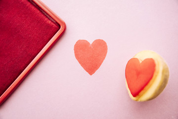 Objects: Heart shaped potato stamp on pinkpaper