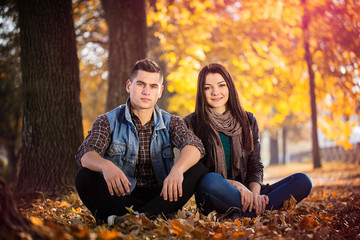 couple man and woman sitting in the park