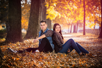 couple man and woman sitting in the park