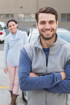 Young couple smiling at the camera