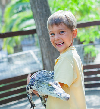 Boy with crocodile.