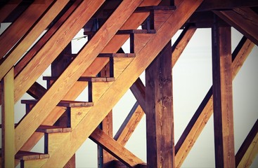 wooden staircase to climb above a wooden Stilt House over the se