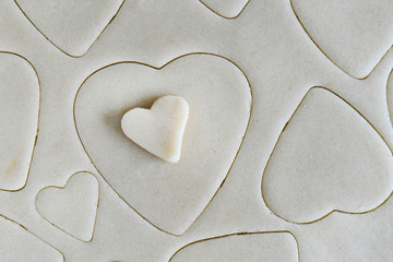 Making Cookies for St. Valentines Day - Dough and Heart Shaped C