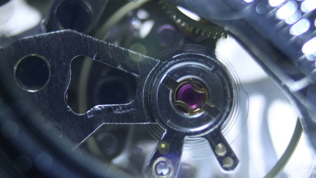 Macro time lapse of a mechanical ticking watch
