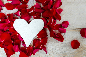 Love: white reart and red rose petals :)