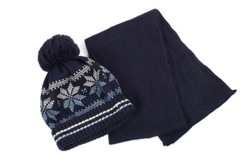 Cold winter clothing - hat or cap, scarf.