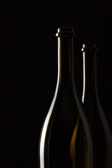 Silhouettes of elegant wine bottles