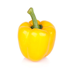 ripe yellow bell pepper on white background.
