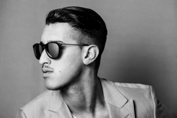 Fototapeta premium Man wearing sunglasses profile black and white