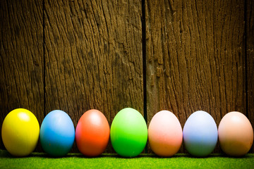 Easter eggs on wood background