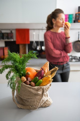 Closeup on shopping bag with fresh vegetables from local market