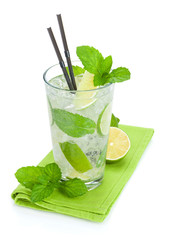 Fresh mojito cocktail and limes with mint