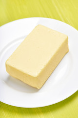 Butter on white plate