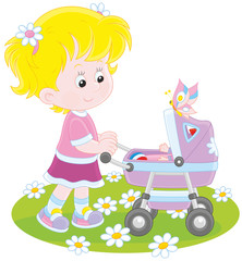 Obraz na płótnie Canvas Girl with a toy baby buggy