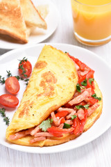 Omelette with vegetables and ham