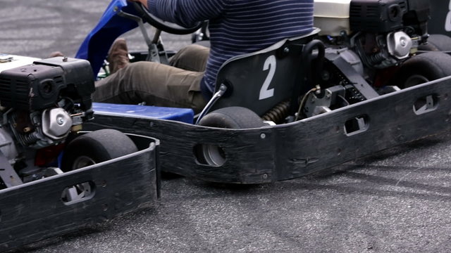 Go-kart drivers shot from the back right at the start of the round