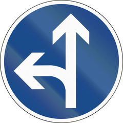 German traffic sign: Go straight or left