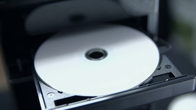Opening CD/DVD tray writing DATA on disc