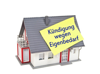Haus mit Zettel und Eigenbedarf