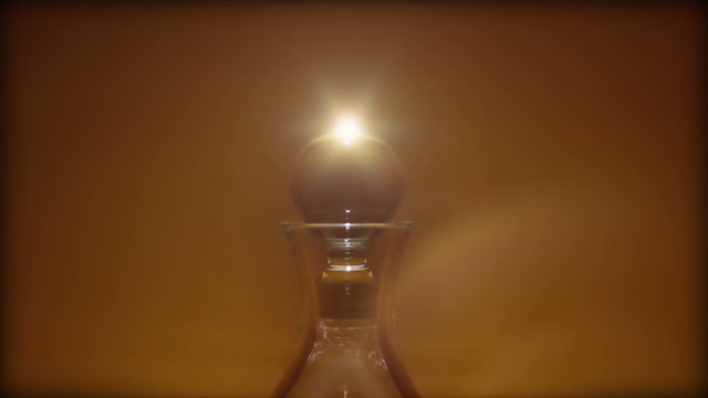 Close up of a glass vase with sand in it