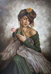 young woman with a flower in her hair and green dress - 77404258
