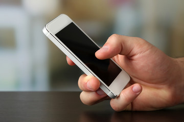 Hand holding smart mobile phone