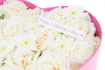 White roses and pearl and diamond held in the heart shape box