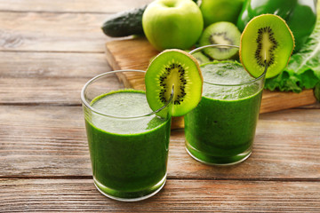 Green fresh healthy juice with fruits and vegetables