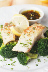 Grilled cod fish steak with broccoli