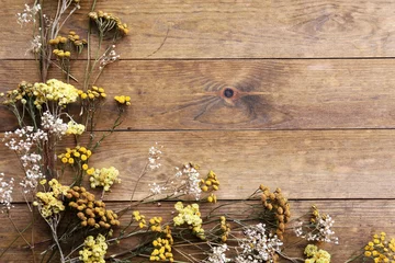 Poster Fleurs Dried flowers on rustic wooden planks background