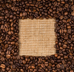 Coffee beans scattered on burlap can be used as background