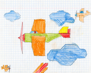 airplane on checkered paper. child drawing.