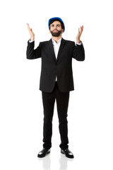 Businessman showing empty copyspace in hands.