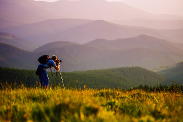 Professional photographer journey through the mountains.