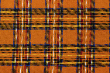 Scottish tartan pattern.Orange plaid print as background. - 77408853
