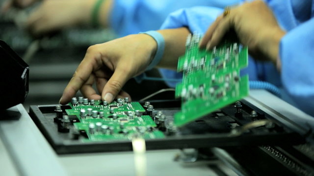 Factory assembly line production of PCBs, Mainland China