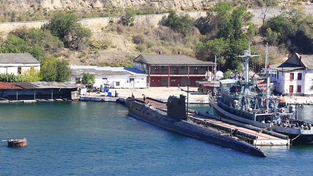 submarine and warship onanchor parking in a bay of Sevastopol