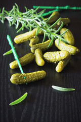 pickles and a sprig of rosemary