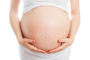 Big pregnant belly isolated on white background, healthy pregnancy concept