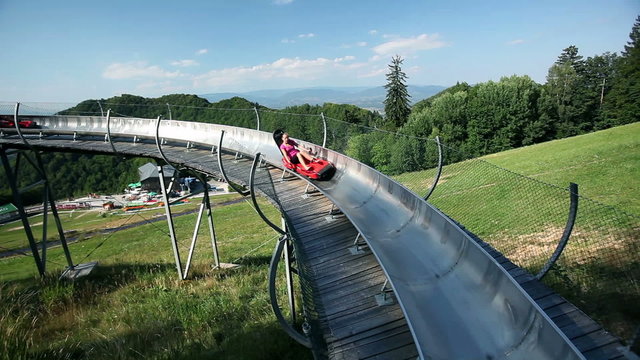 extreme sport activity with bobsled in the pure nature on a sunny day 